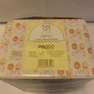 Enesco Precious Moments Figurine - A Very Special Bond